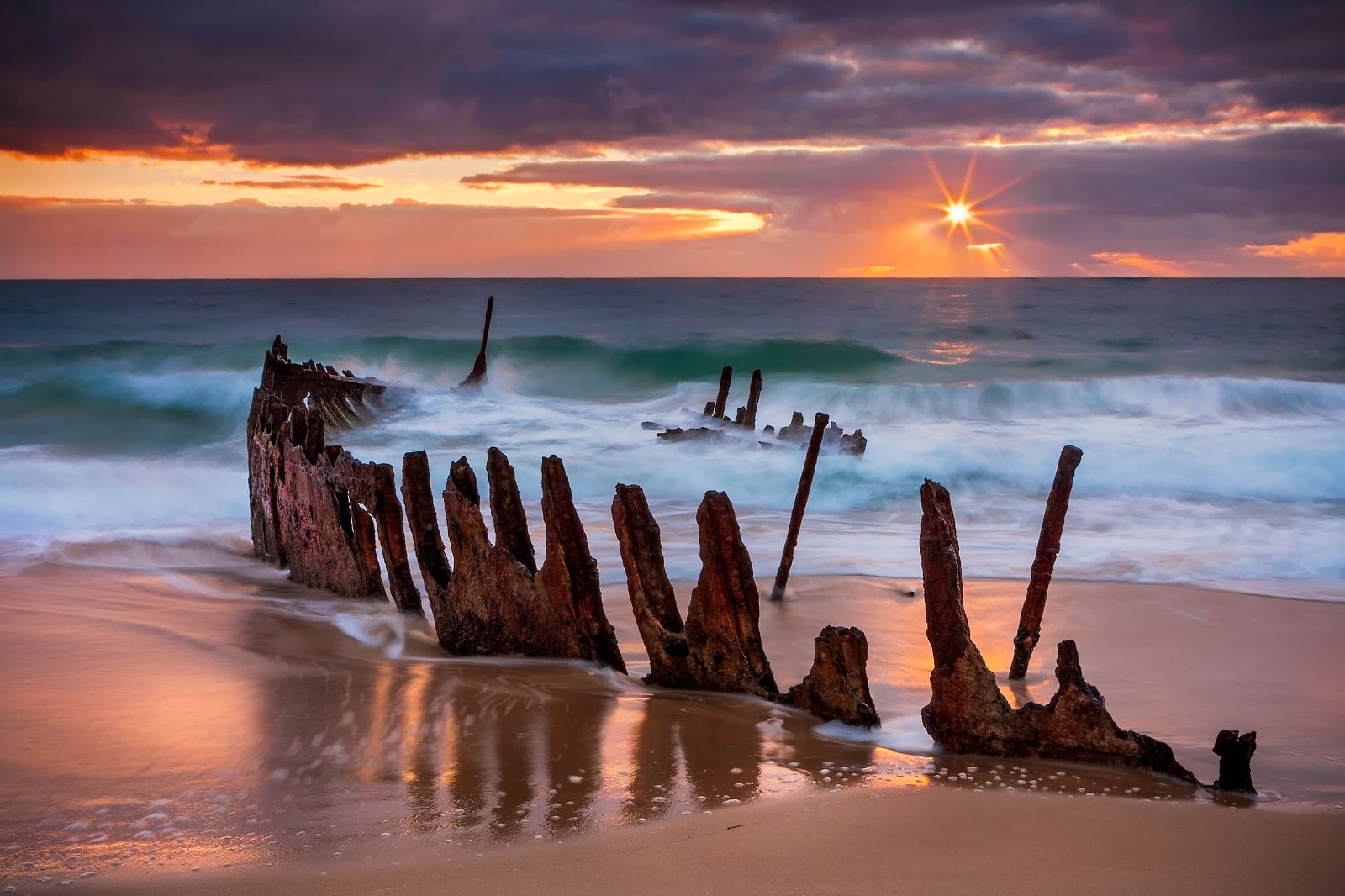 Sunrise over the shipwreck S.S. Dicky, Sunshine Coast, Australia