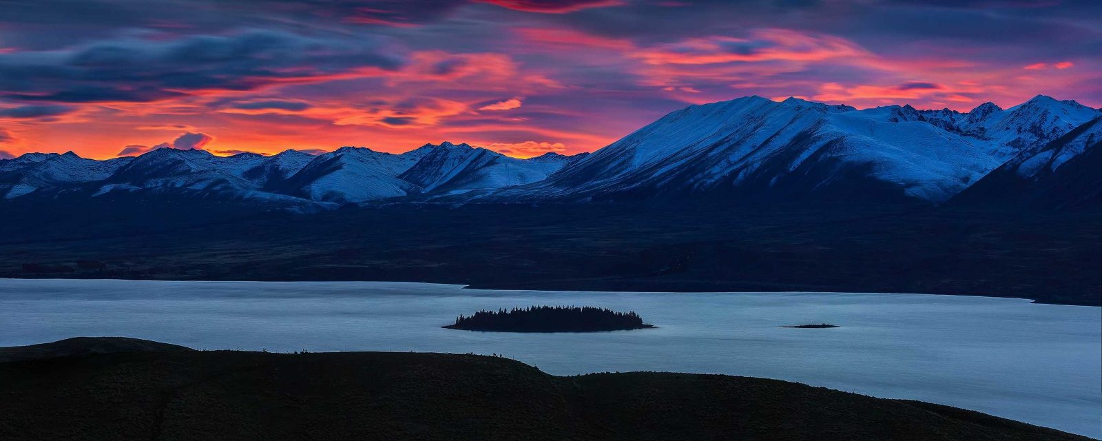 Intense sunrise over Moutuariki at Lake Tekapo, New Zealand